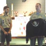 Luke Henning being presented with a special design Jacket, that the Seminole Tribe allows only to Troop #2001 for Eagle Scouts