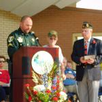 
Bobby Hunter, Chairman City of Bonita Springs Veterans Advisory Committee & Adam Prentki III, Commander of American Legion Post 303 & ET Brisson Detachment 063 making a presentation to 100-year old WWII Veteran