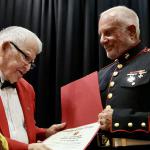 
Senior Marine of the Year Jerry Van Hecke presenting 2025 Marine of the Year to VK {Mel] Melhado